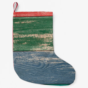 Texture of colour wooden surface as background, to small christmas stocking