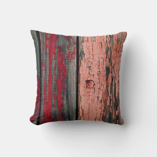 Texture of old wooden fence painted in red and ora cushion
