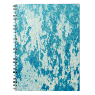 Textured blue background made of dense fabric. Con Notebook