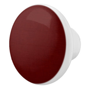Textured dark red, red-brown. ceramic knob