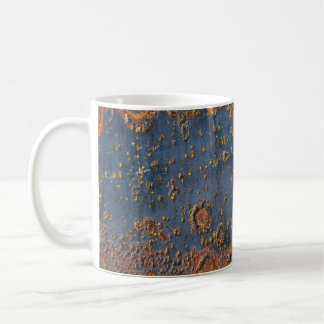 Textured rusted metal background. coffee mug