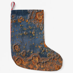 Textured rusted metal background. small christmas stocking