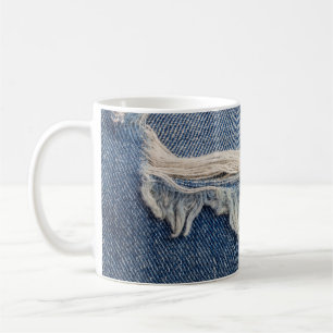 Textures ripped jeans background. coffee mug