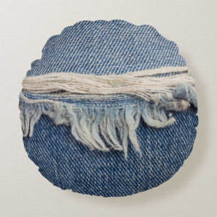 Textures ripped jeans background. round cushion