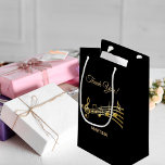 Thank You gold music notes on elegant black Small Gift Bag<br><div class="desc">Black background with faux gold music notes. With the text: Thank You! Golden hand lettered style script. Template for a name or names.
Perfect as a favour bag for a birthday party,  wedding,  wedding anniversary,  baby shower or bridal shower!</div>