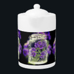 Thank You Lord (Purple Pansies) Teapot<br><div class="desc">Lovely designed teapot with a printed image of an acrylic painting. The painting has lovely pansies inside a crystal jar. On top of the crystal jar there are the words of giving God all the glory by saying,  "Thank You Lord."</div>