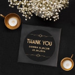 Thank You Modern Art Deco Black and Gold Wedding Classic Round Sticker<br><div class="desc">The Modern Art Deco Black and Gold Wedding Classic Round Sticker is the perfect way to say thank you with style. It features a sleek black background and elegant gold geometric accents. Ideal for sealing envelopes or adding a personal touch to your favours, this sticker captures the sophistication of modern...</div>