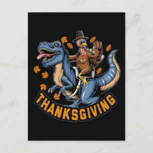 Thanksgiving holiday turkey riding a tyrannosaurus postcard