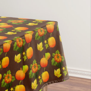 Thanksgiving Pumpkins & Fall Leaves on Brown Tablecloth