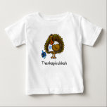 Thanksgivukkah Jewish Turkey Baby T-Shirt<br><div class="desc">Once in a lifetime comes Thanksgivukkah! That's because for the first time since 1888 Hanukkah and Thanksgiving are at the same time. So, the blending of the word "Thanksgiving Hanukkah" now is "Thanksgivukkah"! To celebrate this, I designed a fun Jewish Turkey who is playing with a dreidel and wears a...</div>