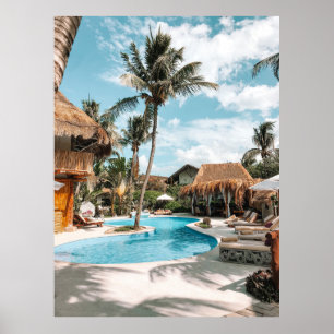 Thatch huts and houses by the pool during day poster