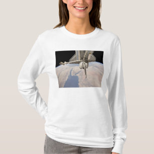 The aft section of the docked space shuttle T-Shirt