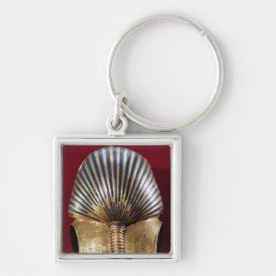 The back of the gold mask key ring