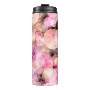The backdrop of pale yellow bubbles. thermal tumbler