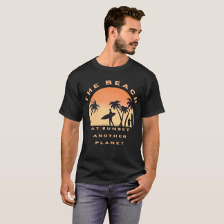 the beach at sunset another planet T-Shirt
