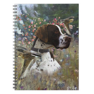 The beautiful pointer in the field  notebook