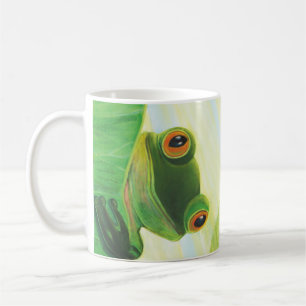 The big-eyed green frog behind lily pad   coffee mug