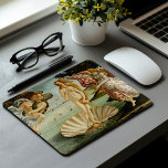 The Birth of Venus | Botticelli Mouse Mat<br><div class="desc">Sandro Botticelli’s iconic painting The Birth of Venus depicts the goddess Venus emerging from the sea upon a shell, symbolizing her birth. Surrounded by mythological figures, she is delicately posed, with her long, flowing hair and soft, ethereal expression embodying beauty and grace. The painting is celebrated for its harmonious composition,...</div>