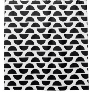 The black halves of the circle create a simple pat shower curtain