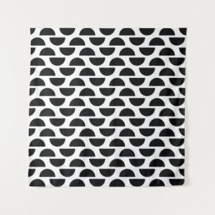 The black halves of the circle create a simple pat tapestry