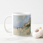 The Boardwalk at Trouville by Claude Monet Coffee Mug<br><div class="desc">The Boardwalk at Trouville (1870) by Claude Monet is a vintage impressionist fine art painting featuring a beach at a seaside resort in Normandy, France on a beautiful sunny day. About the artist: Claude Monet (1840-1926) was a founder of the French impressionist painting movement with most of his paintings being...</div>