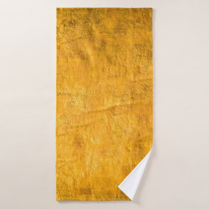 The brass concrete surface glows from the walls of bath towel