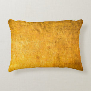 The brass concrete surface glows from the walls of decorative cushion