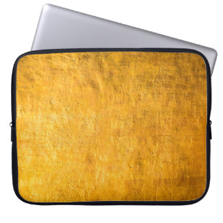 The brass concrete surface glows from the walls of laptop sleeve