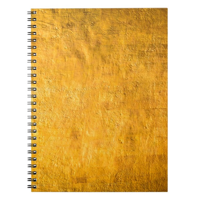 The brass concrete surface glows from the walls of notebook (Front)