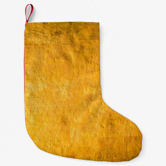 The brass concrete surface glows from the walls of small christmas stocking