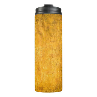 The brass concrete surface glows from the walls of thermal tumbler