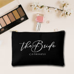 The Bride Personalised Chic Bachelorette Party Accessory Pouch<br><div class="desc">This chic,  simple bride black cosmetic bag features your name underneath elegant white typography reading The Bride. Customise these elegant,  modern bridal party accessory pouch for your wedding events like the bachelorette party.</div>