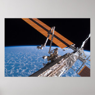 The Canadarm2 and solar array panel wings Poster