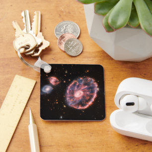 The Cartwheel Galaxy And Its Companion Galaxies. Key Ring