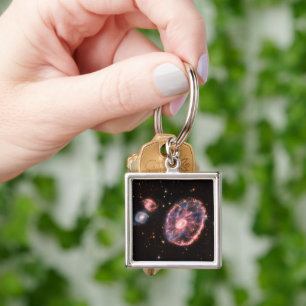 The Cartwheel Galaxy And Its Companion Galaxies. Key Ring