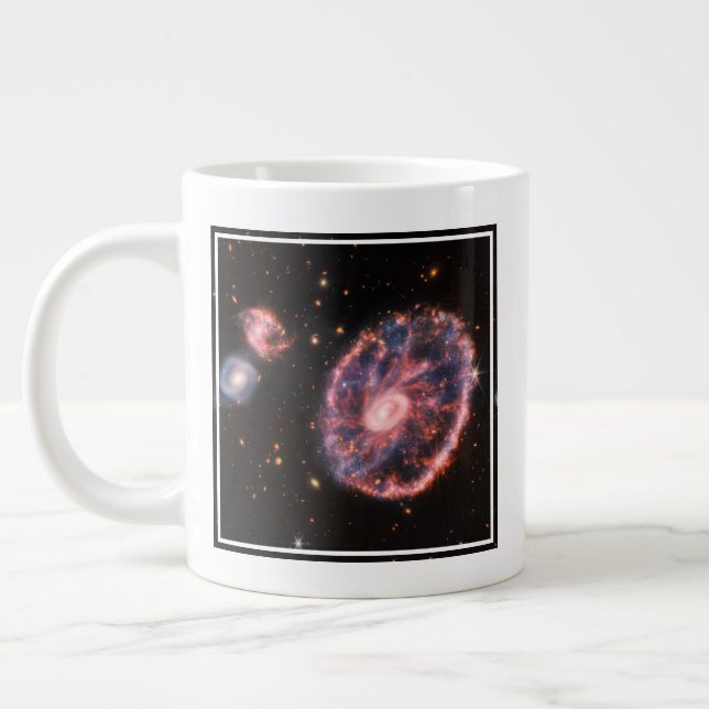 The Cartwheel Galaxy And Its Companion Galaxies. Large Coffee Mug (Left)