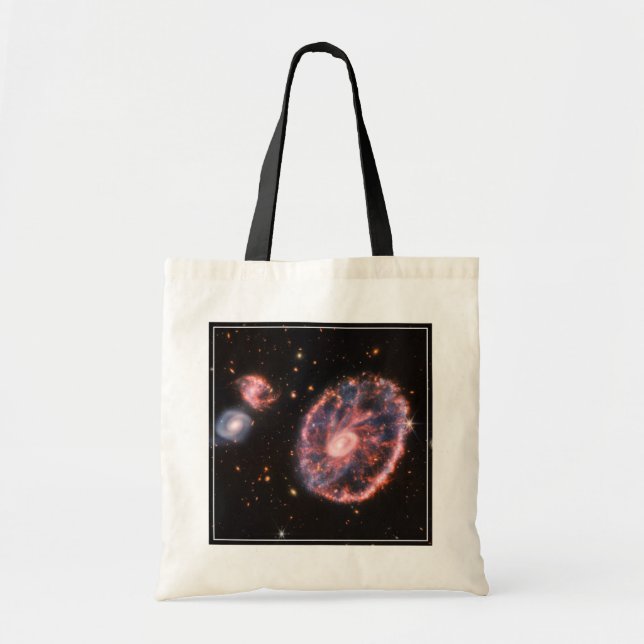 The Cartwheel Galaxy And Its Companion Galaxies. Tote Bag (Front)
