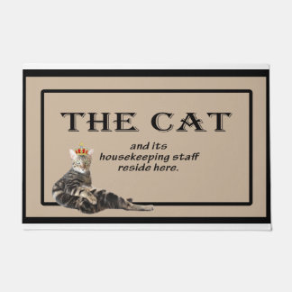 The Cat and its housekeeping staff reside here Doormat