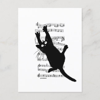 The cat hangs on musical notes