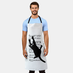 The cat hangs on musical notes apron