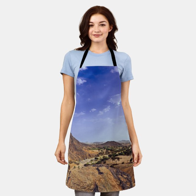 The charming beauty of desert nature under a blue  apron (Worn)