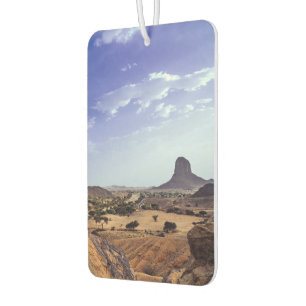 The charming beauty of desert nature under a blue car air freshener