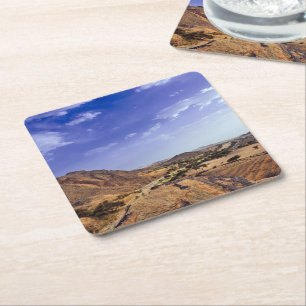 The charming beauty of desert nature under a blue  square paper coaster