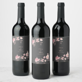The chic pink sakura flowers on a dark grey wine label