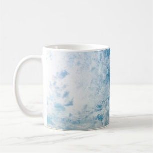 The clear sky during the day when the light passed coffee mug