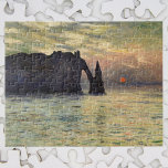 The Cliff Etretat, Sunset by Claude Monet Jigsaw Puzzle<br><div class="desc">The Cliff, Etretat, Sunset (1883) by Claude Monet is a vintage impressionist fine art nautical painting. The sun is low in the sky over the ocean. A maritime seascape featuring a rocky outcrop near the shore at Etretat, France. About the artist: Claude Monet (1840-1926) was a founder of the French...</div>