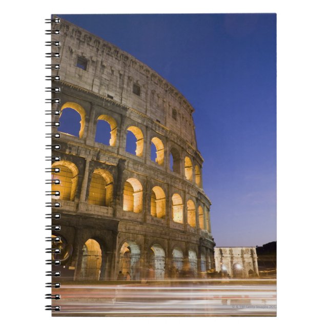 the Colosseum ampitheatre illuminated at night Notebook (Front)