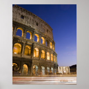 the Colosseum ampitheatre illuminated at night Poster