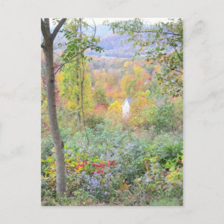 the colours of a mountain fall postcard