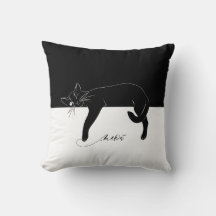 The cunning black cat dangled its paws